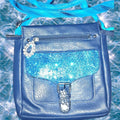 Blue Shoulder Bag with blue sparkle and a fancy zipper
