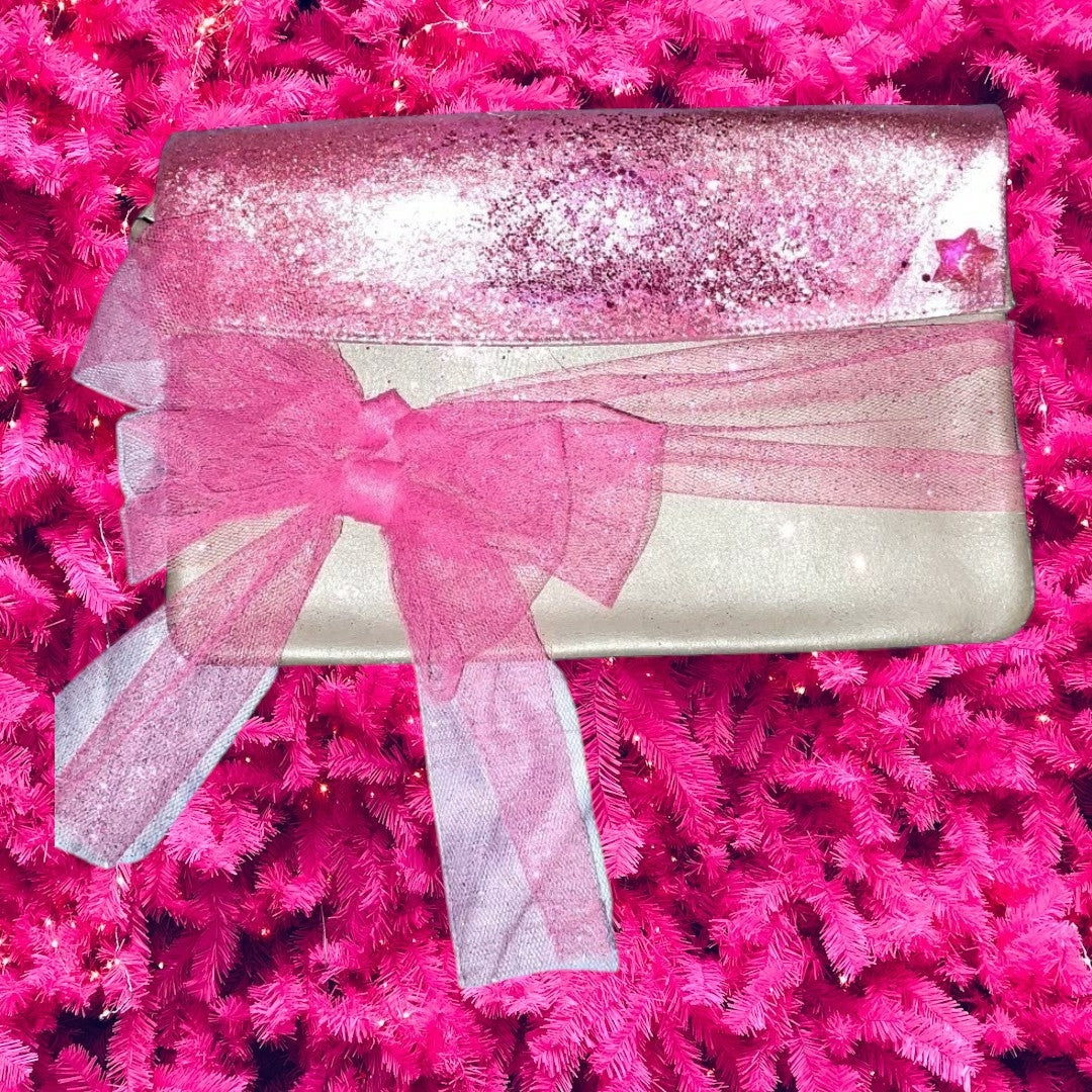 Taupe Silver colored clutch with pink sparkle and bow